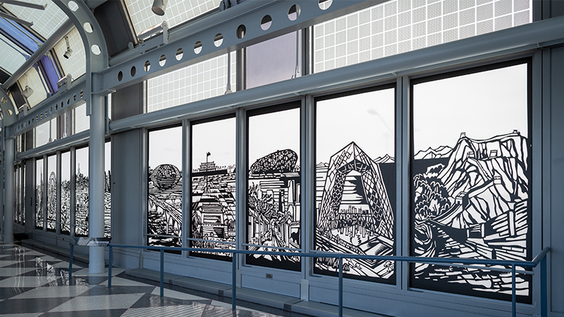 Colorful public artwork inside an O'Hare corridor