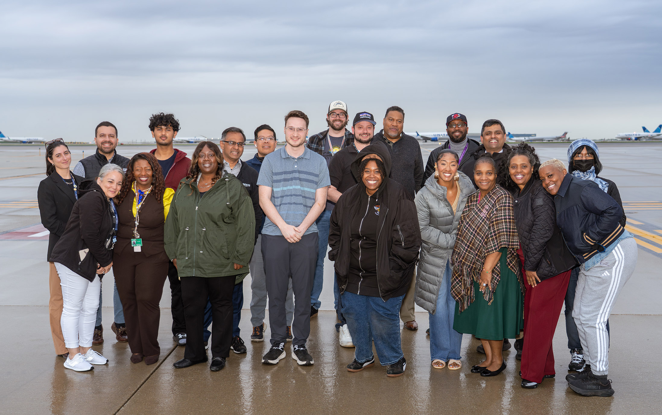 Group of ACPP students standing on the airfield.